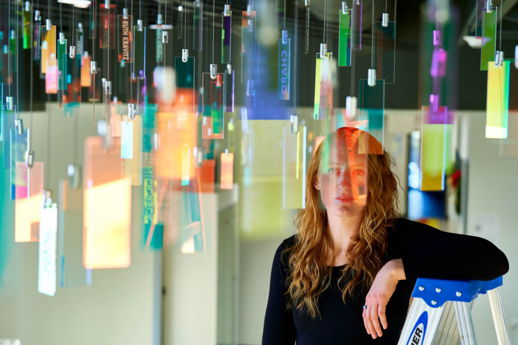 eliza redman behind handing stained glass