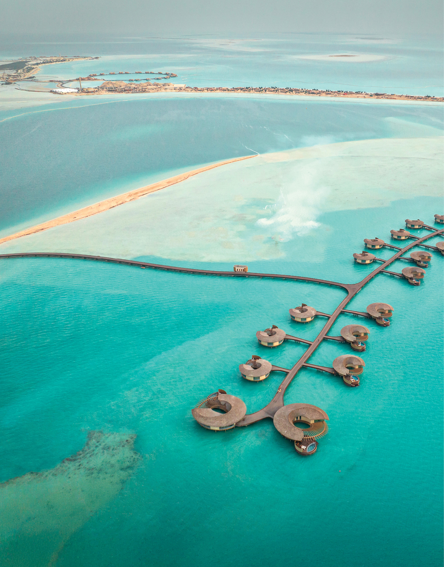 A view of a small island in the middle of the ocean