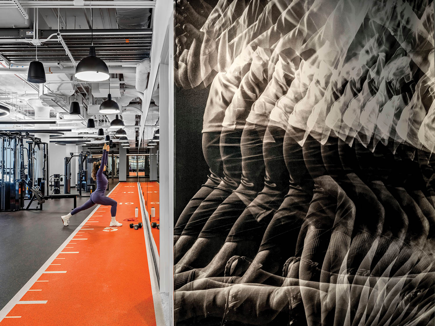 gym area with large graphic and orange flooring