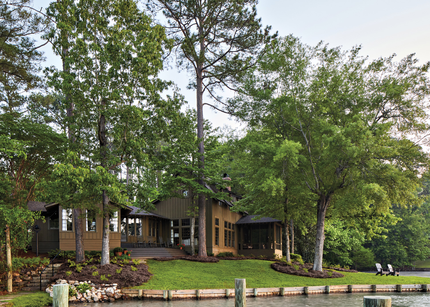 exterior of an Alabama lake house surrounded by trees