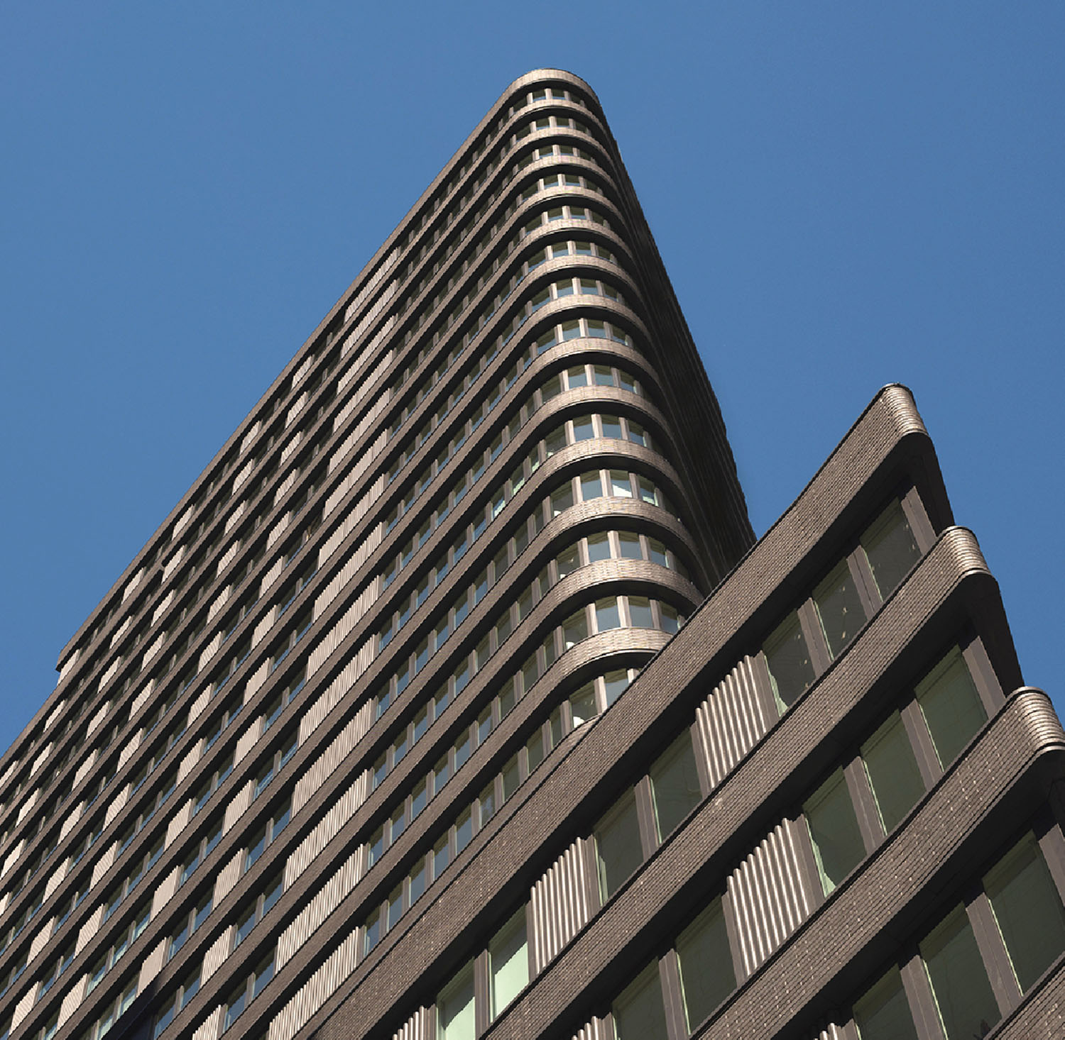 A tall building with a clock on the top