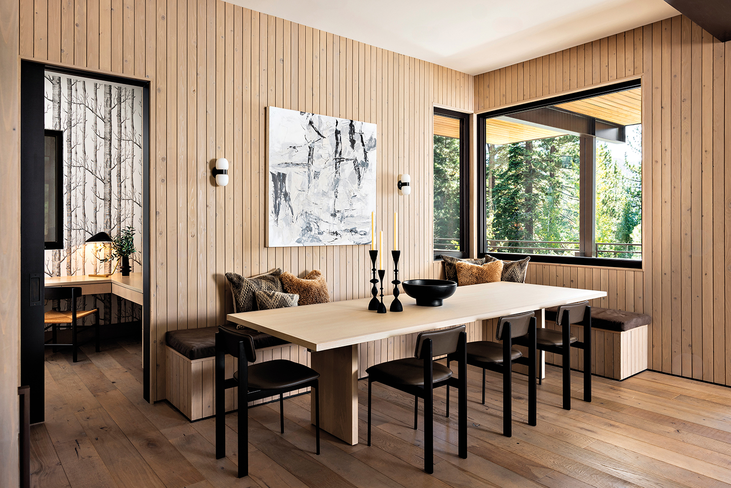 minimalistic scandinavian inspired dining room with wood paneling