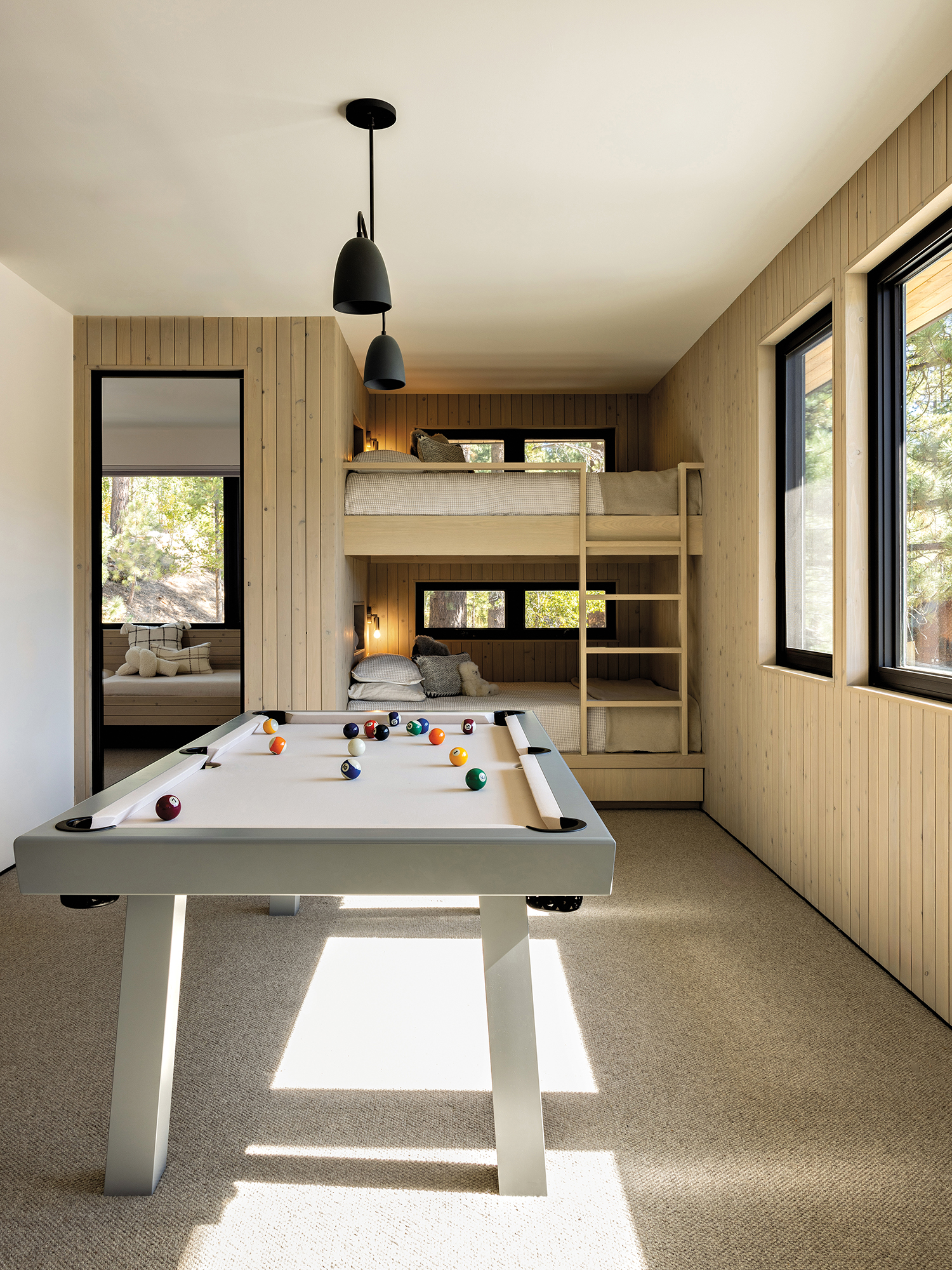 game and media room with bunk beds for guests and pool table