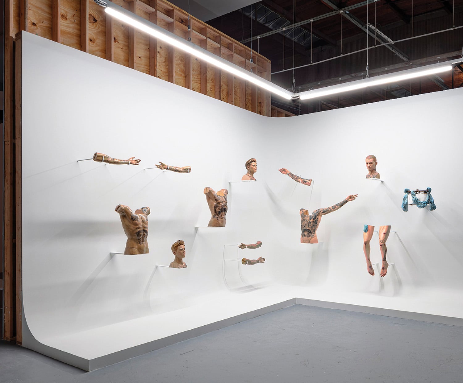 A group of people are hanging on a wall