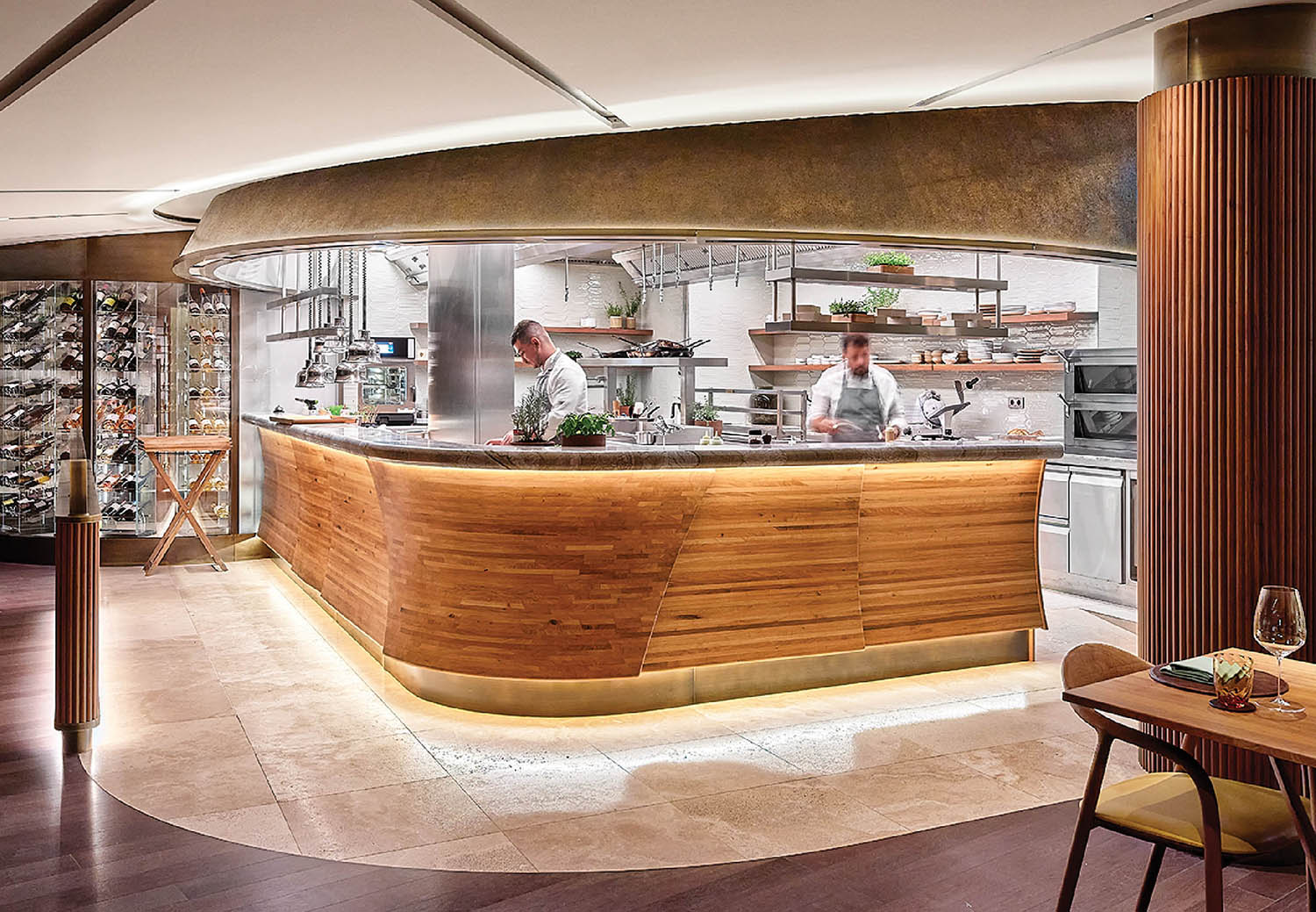 A restaurant with a wooden counter and a bar