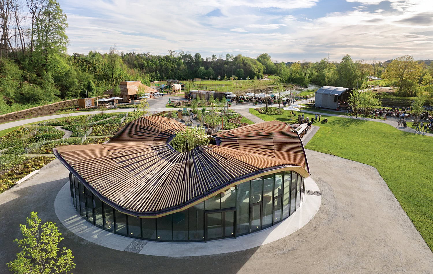 A circular building with a wooden roof