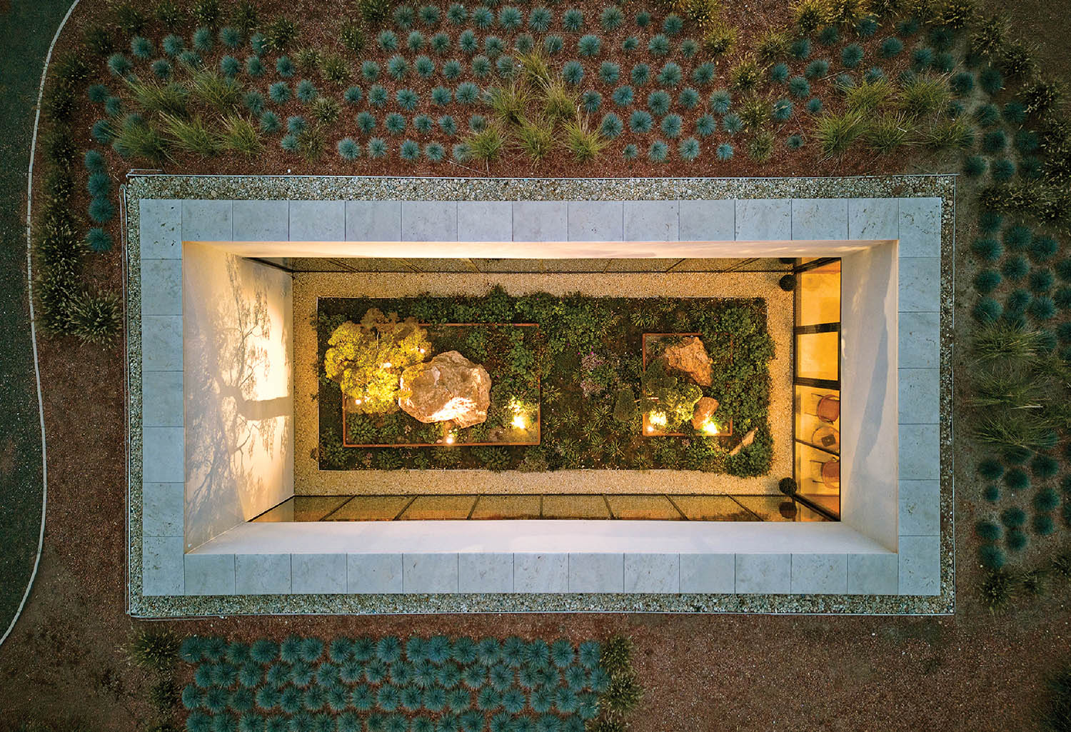 A small garden with a fire pit