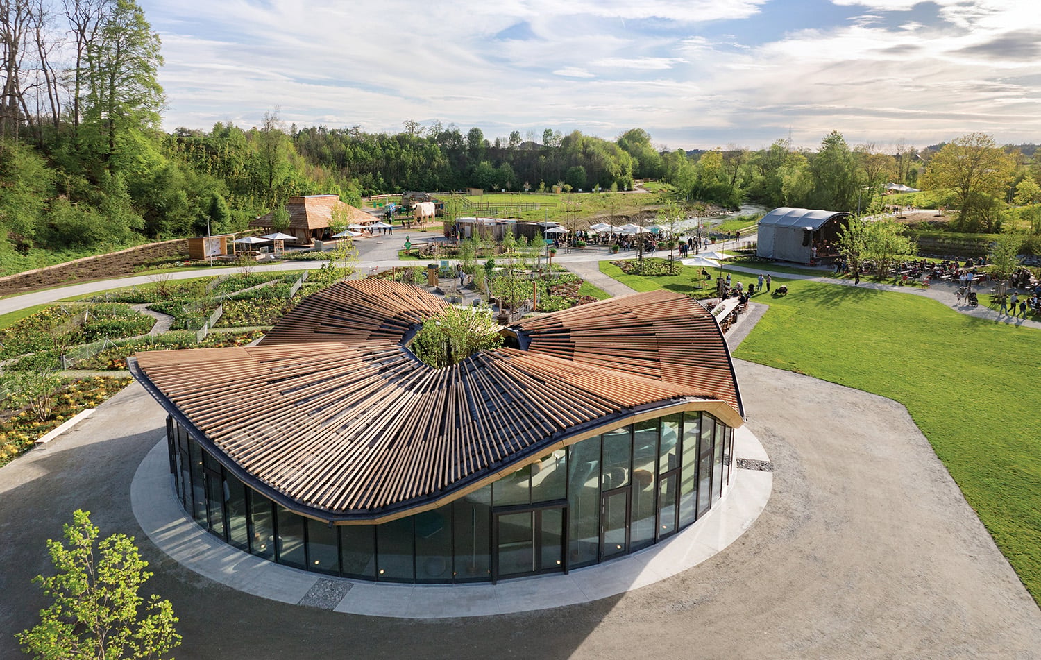 A circular building with a wooden roof